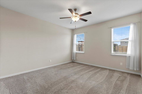 Unfurnished room with carpet floors and ceiling f