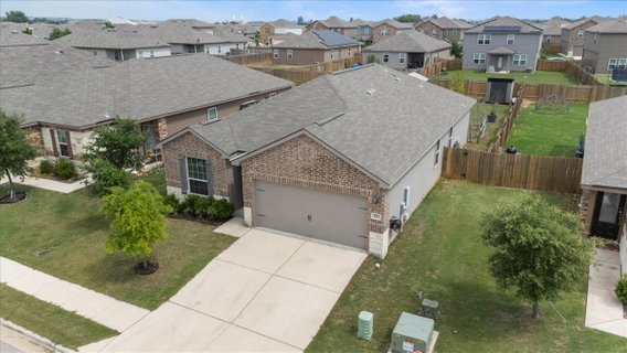 View of front of house with an attached garage, d