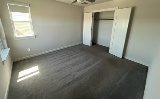 Unfurnished bedroom featuring a closet, ceiling f